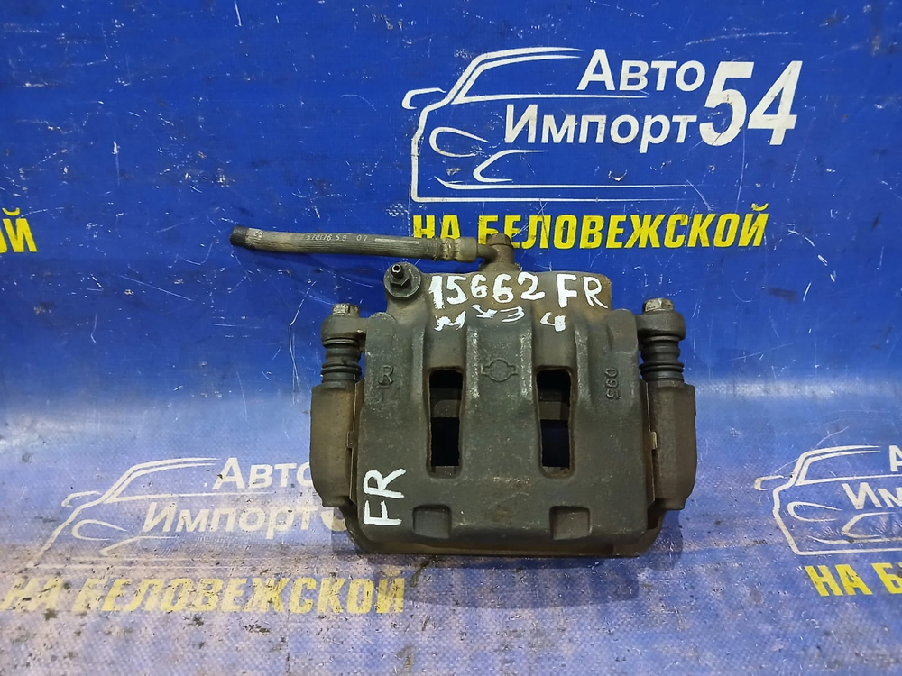 Суппорт тормозной передний правый NISSAN CEDRIC 1999-2004