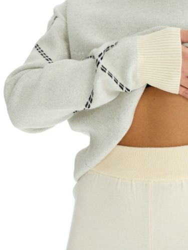 Костюм трикотажный молочного цвета