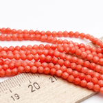 Коралл тонированный граненый бусины, диаметр около 3,1 мм, цена за отрезок 19 см (1/2 нити)