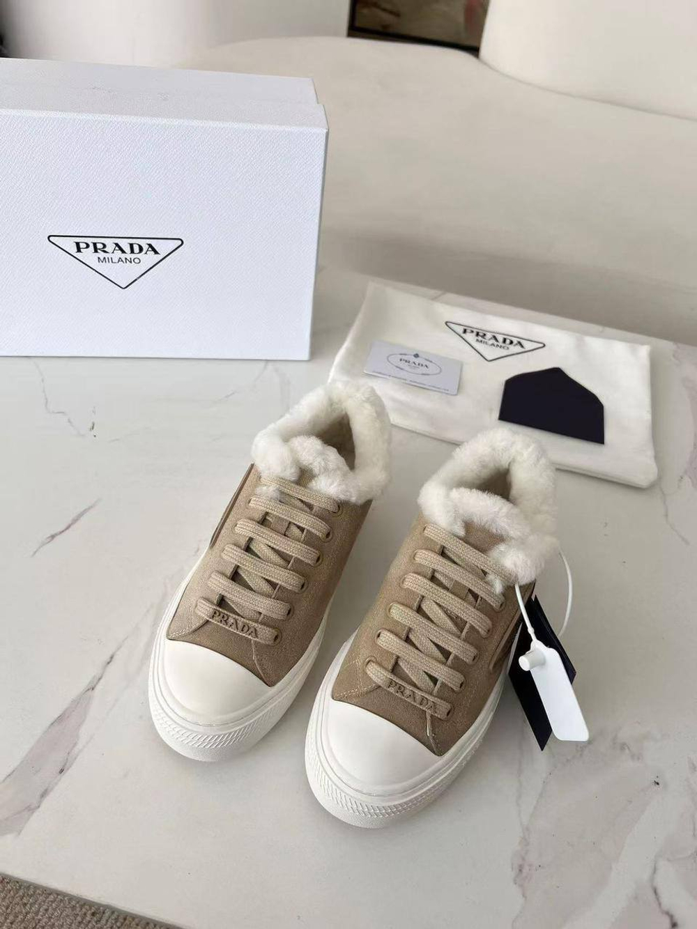 Кроссовки Prada