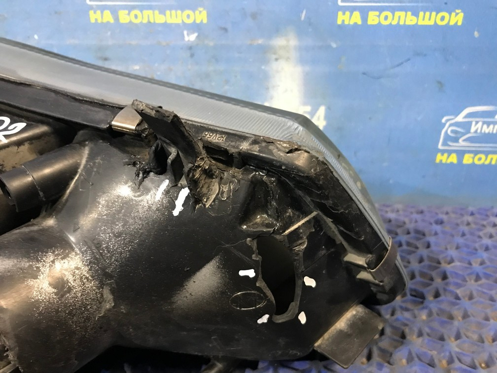 Фара передняя левая NISSAN LIBERTY 1999