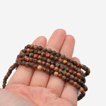 Риолит (яшма леопардовая), бусины в форме шара 4,5мм