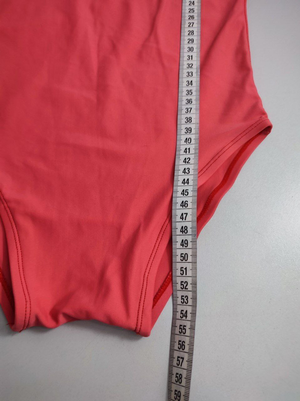 Боди нежного цвета на 9-10 лет