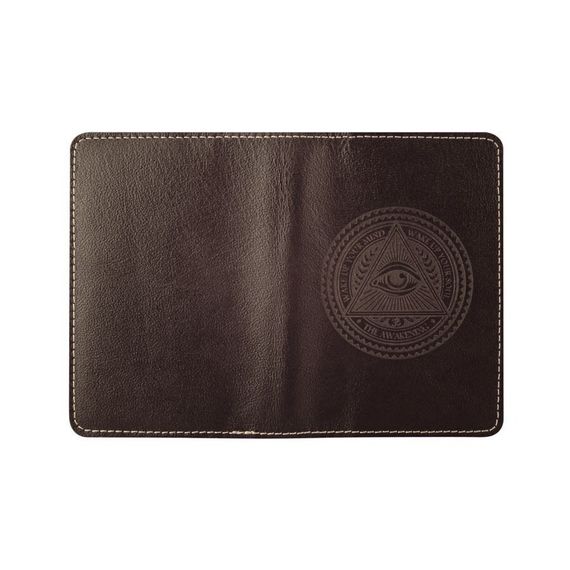 Развернутая фотография обложки из гладкой кожи темно коричневого цвета с всевидящим оком.