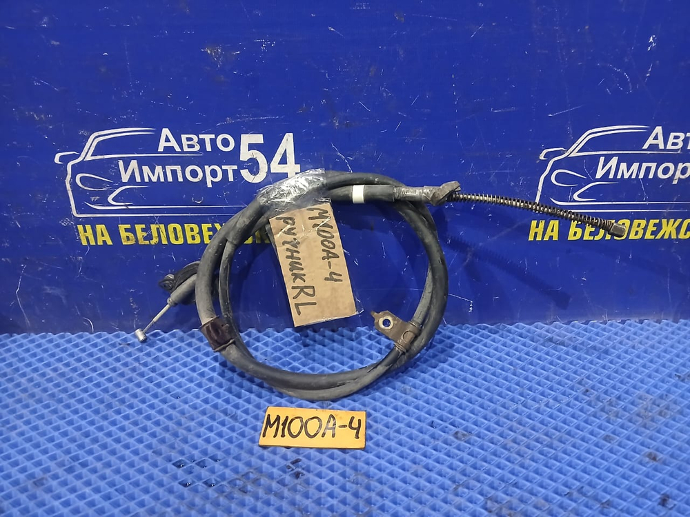 Трос ручника левый TOYOTA DUET 1998-2000