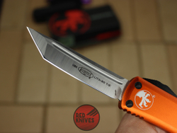 Нож Microtech UTX-85 T/E - оранжевая рукоять, танто клинок, сатин RK-394
