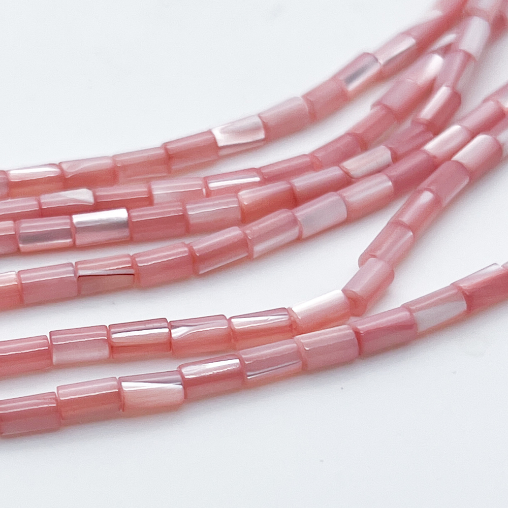 Перламутр тонированный, цвет розовый, размер около 5*2,8 мм, цена за отрезок 36-37 шт (1/2 нити)