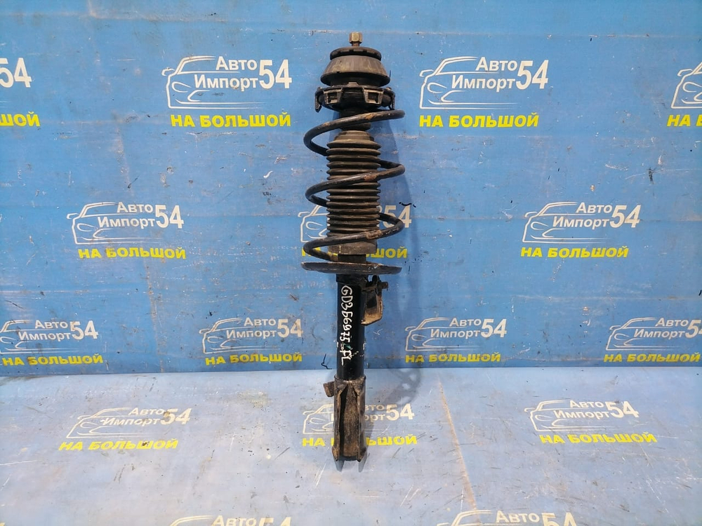 Стойка передняя левая Honda FIT 2001-2007