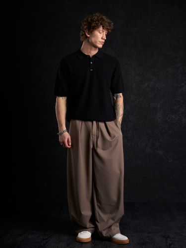 Черная трикотажная футболка-поло Laine New