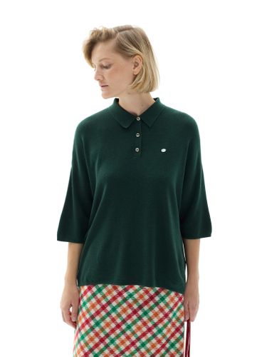 Зеленая трикотажная футболка-поло