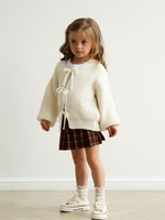 Кардиган с бантиками, Молоко