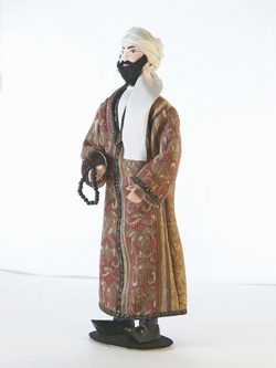 Кукла фарфоровая Узбек в традиционном костюме