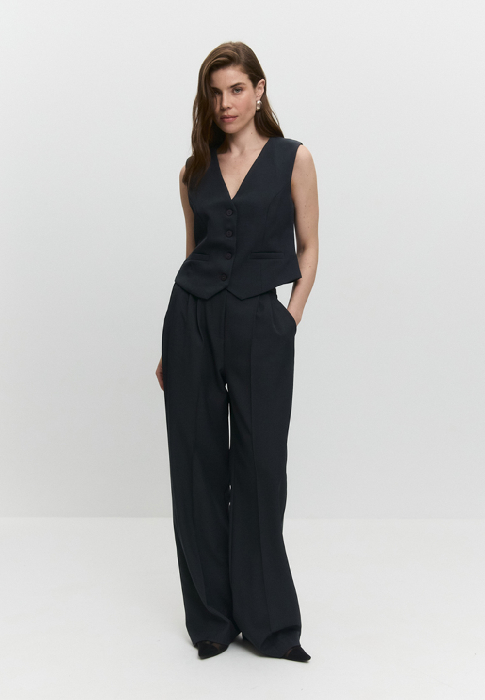 Брюки с простроченными стрелками