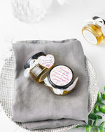 Набор свадебных бонбоньерок (свадебные комплименты для гостей) "Эликсир счастья", 9 баночек с медом по 35 грамм