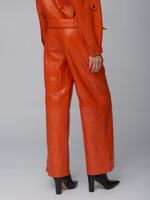Женские кожаные брюки рыжие прямого кроя