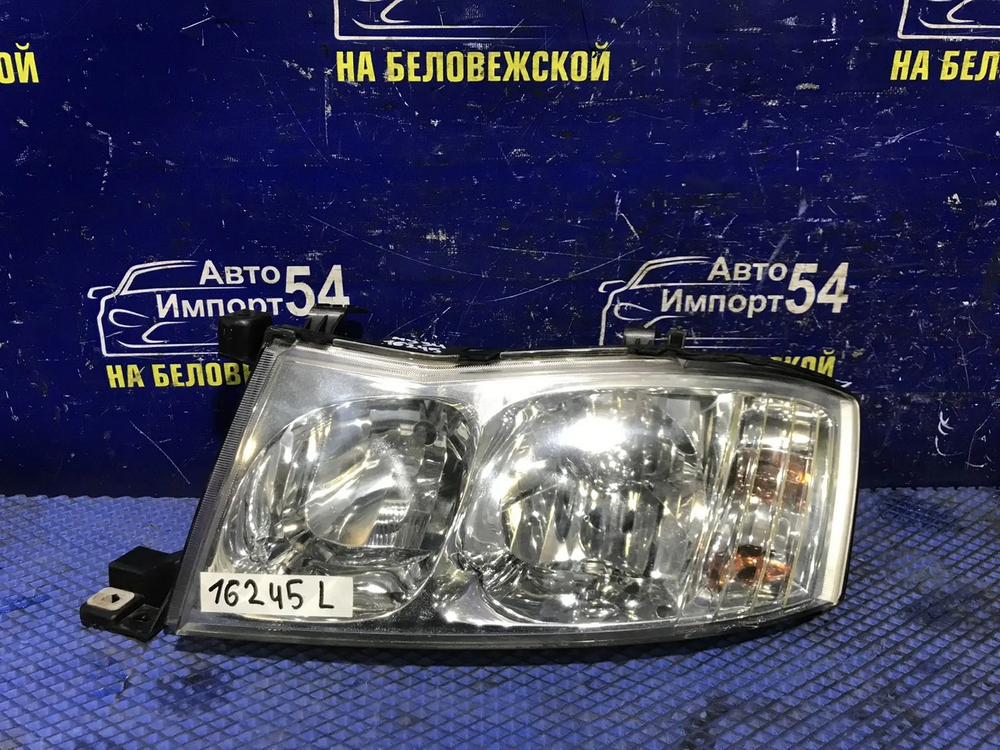 Фара передняя левая NISSAN CEDRIC 1999-2001