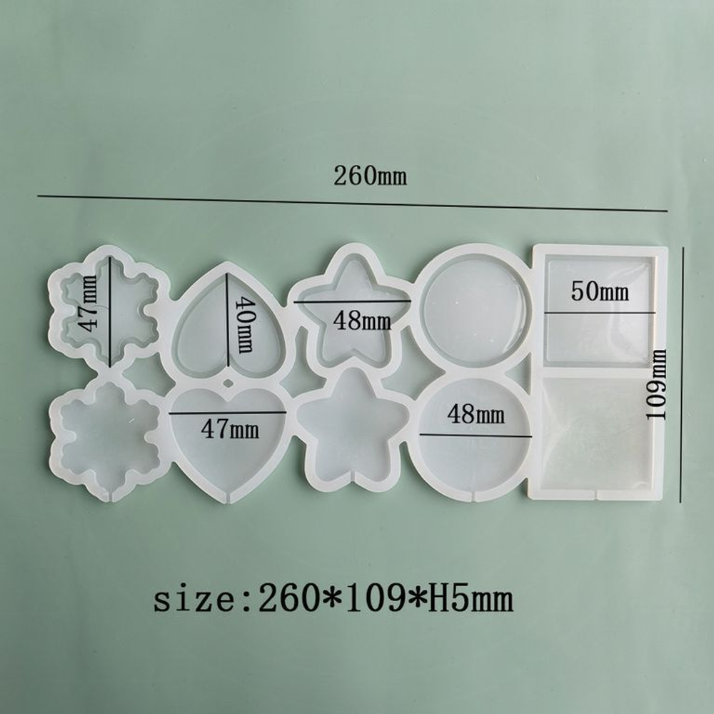 Силиконовая форма для леденцов «Погремушки микс 5 фигур»