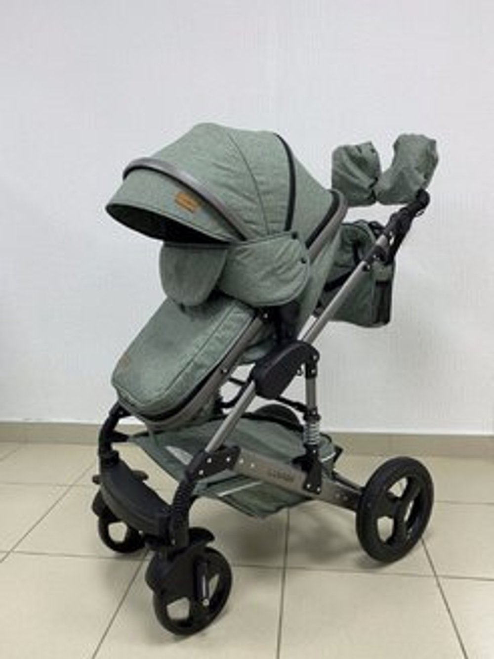 Коляска-трансформер LUXMOM 555-W 2В1 зеленый текстиль