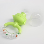 4780630 Ниблер с силикон. сеточкой, ручка-погремушка, вр. поршень, цвет зеленый