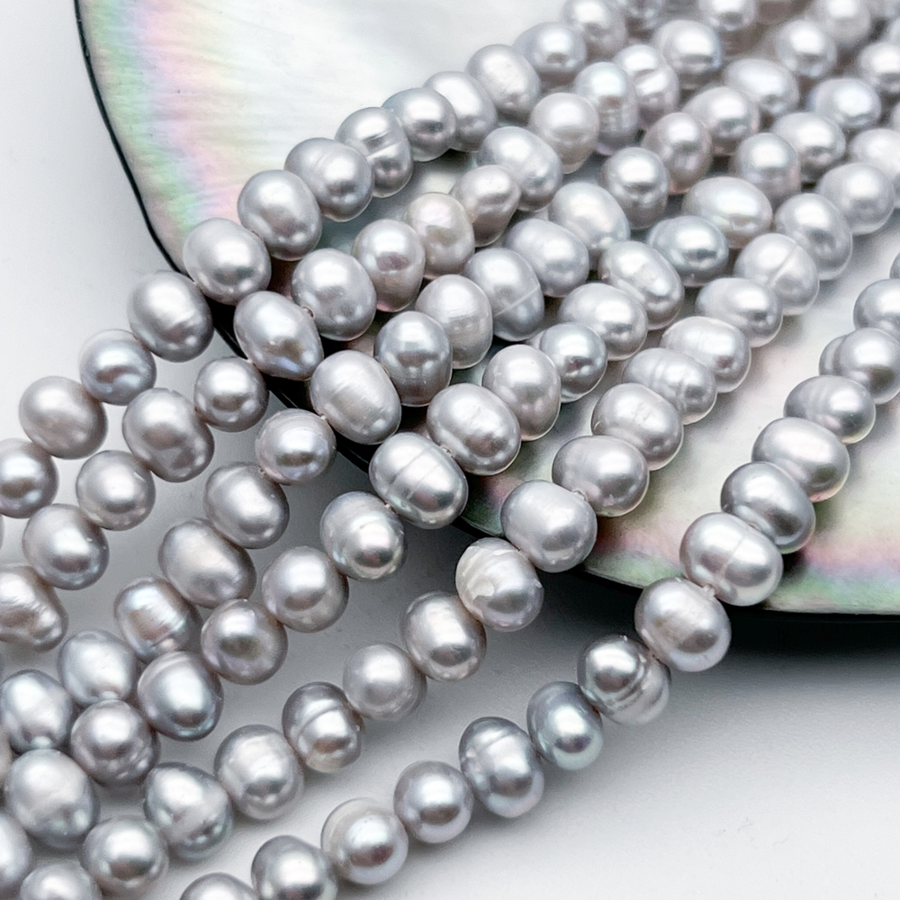 Жемчуг, размер около 4,5*5,5 мм, цена за отрезок 17 см (1/2 нити)