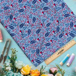 Ткань оксфорд 210 брусника и глаза на голубом фоне