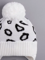 Шапка для девочки на завязках на осень