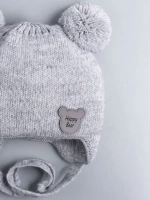 Шапка детская осенняя с завязками и помпонами