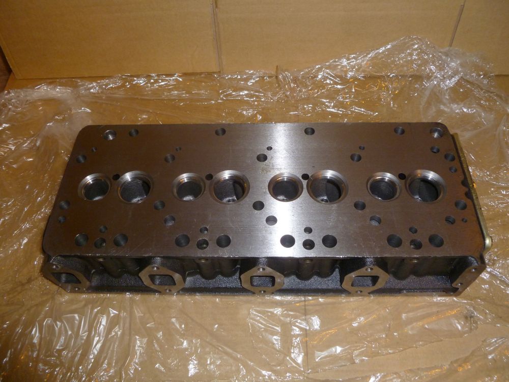 Головка блока цилиндра в сборе (с втулками ,седлами,клапанами .пружинами)TDQ 20 4L/Cylinder head Assy (with sleeves, seats, valves and springs)