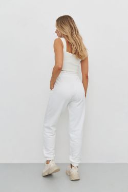 Джоггеры свободные без начеса кремового цвета