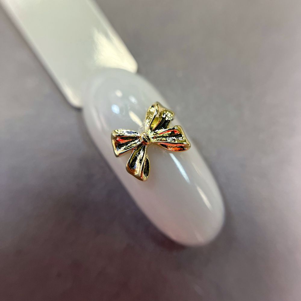 1853 Фигурки объёмные "Бантики" металл 5 шт