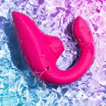 Малиновый вибратор 13,9см с вакуумным стимулятором Womanizer Blend Vibrant Pink WZBD1SG5