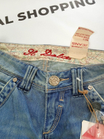 Джинсы IL'DOLCE jeans flare.Цвет голубой с эффектом потёртости. Размер walst:25 -40/42 русский