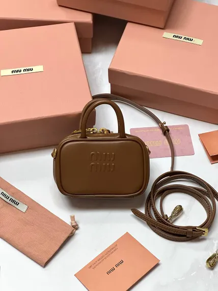 Мини сумка MIU MIU из натуральной кожи в коричневом цвете