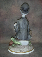 Статуэтка. Фарфор. Шарманщик. Capodimonte. Италия