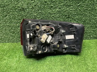 Фонарь левый внешний Toyota Land Cruiser 300 21-нв