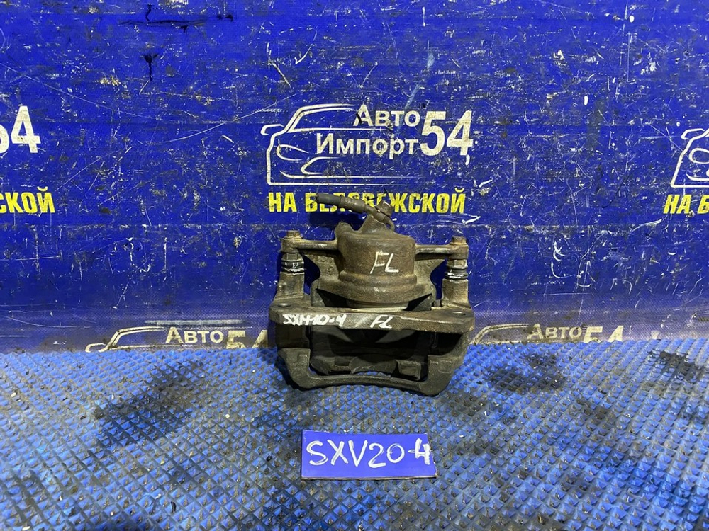 Суппорт тормозной передний левый TOYOTA CAMRY GRACIA 1999