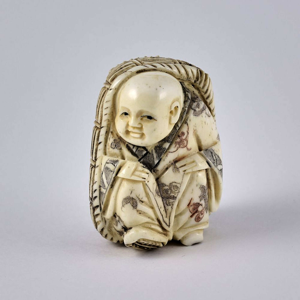 Нэцкэ Ребенок карако в люльке