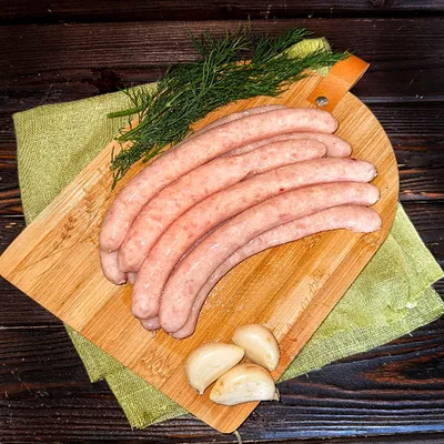 Фотография Колбаски из курицы /500 гр купить в магазине Афлора