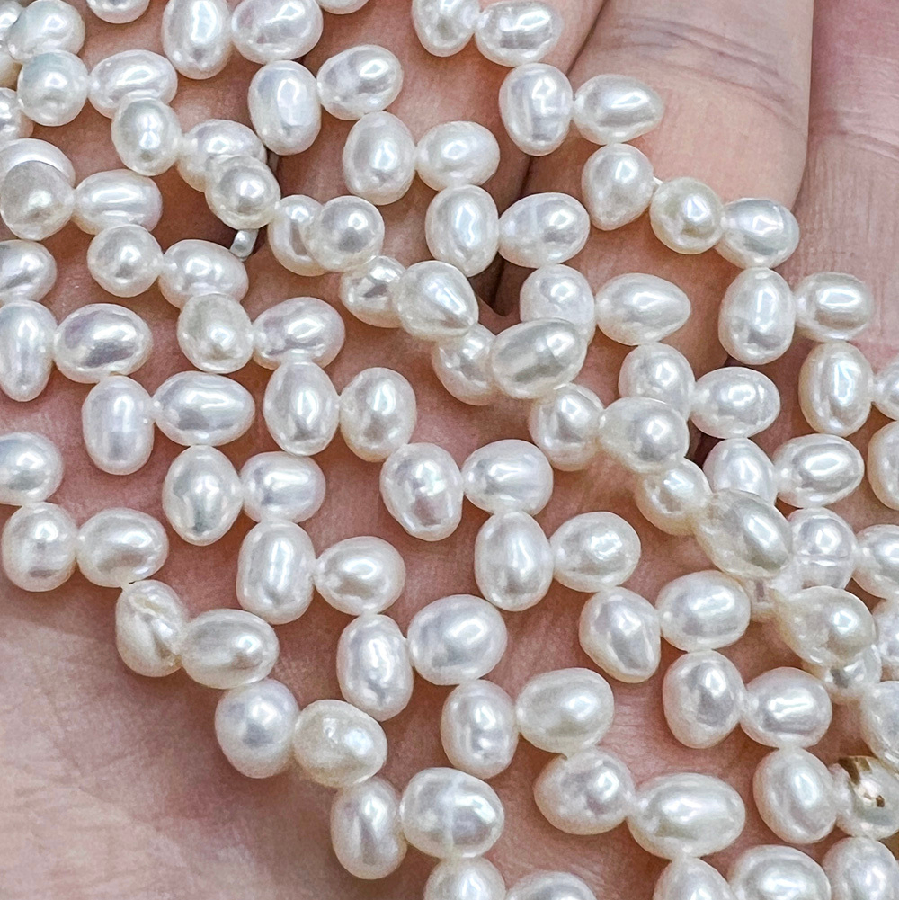 Жемчуг 3А речной бусины Елка 4-6 мм, на нитке 38 см