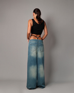 Джинсы бананы