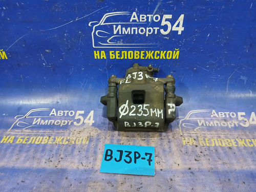 Суппорт тормозной передний левый MAZDA FAMILIA 2001