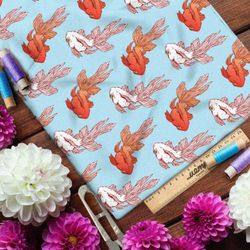 Ткань дюспо золотые и белые рыбки на голубом фоне