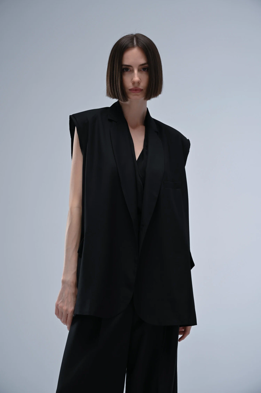 Жилет на пуговицах