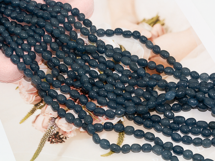 Нить бусин из тонированного кварца 6-7мм (галтовка)