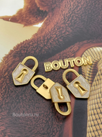 Пуговицы замочек теплое золото с белой перламутровой эмалью Скиапар.