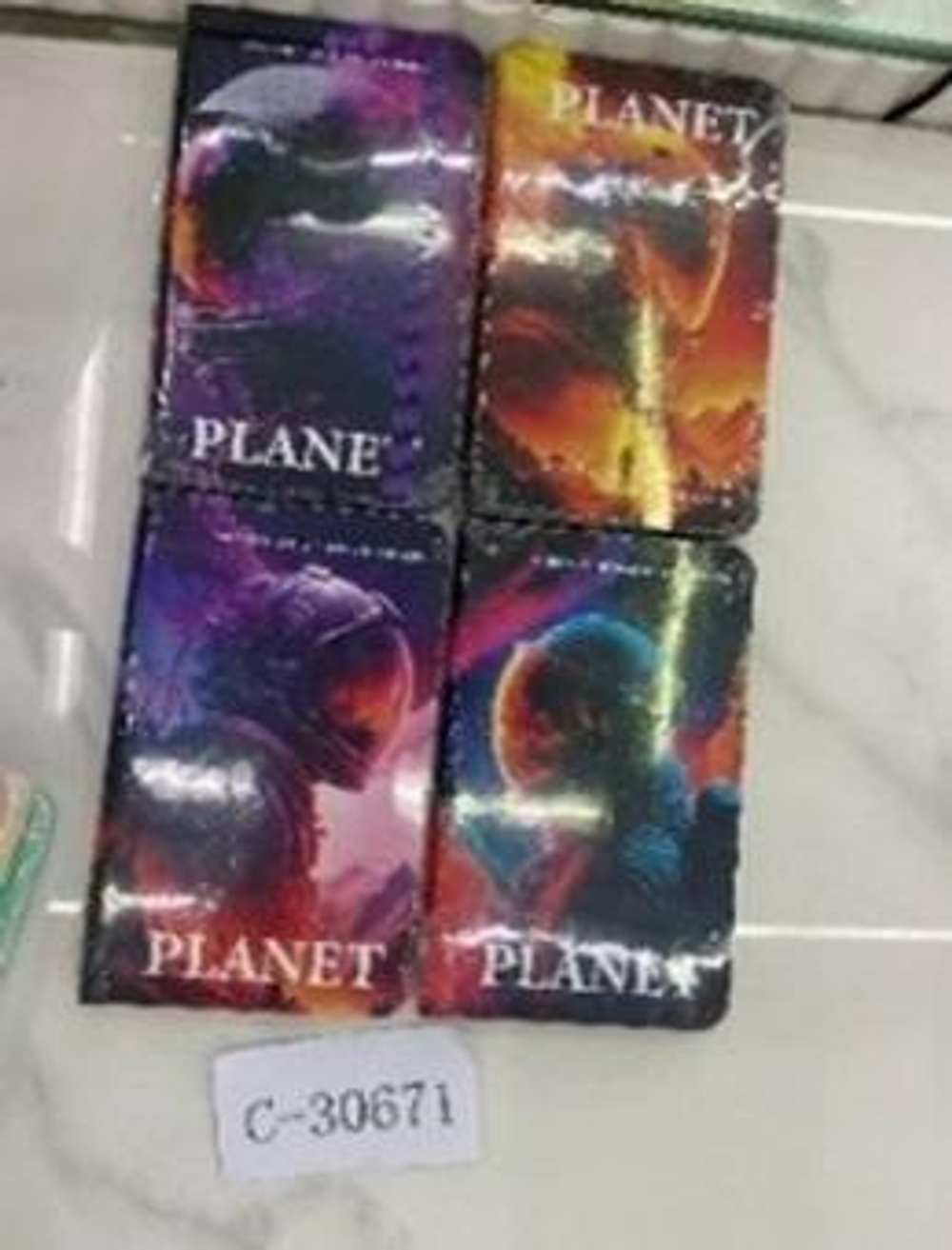 Записная книжка "Космос" А6 80 л, линия, на резинке твердый переплет,14*8,8см, 4 дизайна микс , С-30