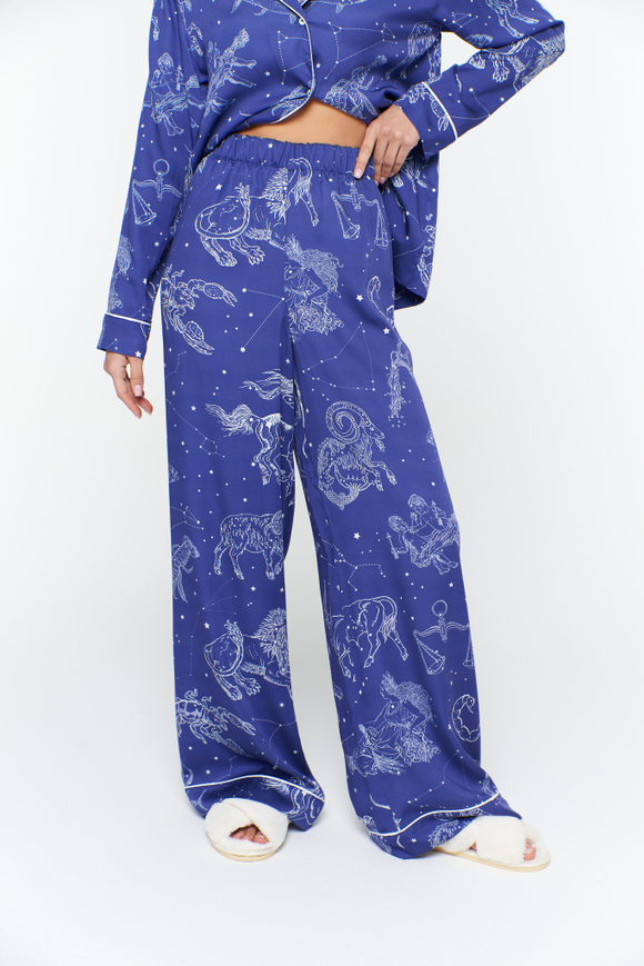 Брюки из вискозного шелка с кантом и зодиаками