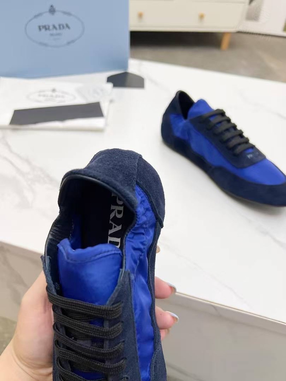 Кроссовки Prada