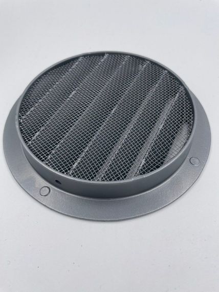 Круглая решетка черного цвета с защитной сеткой от насекомых и наклонными ламелями DEC DSAV 100C (Нидерланды)