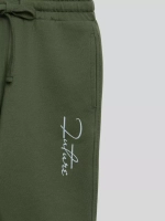 Зеленый костюм для мальчика в школу